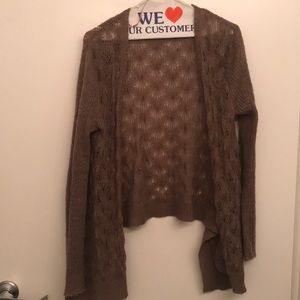 Super cute tan cardigan!